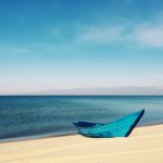 Canoe on serene water.