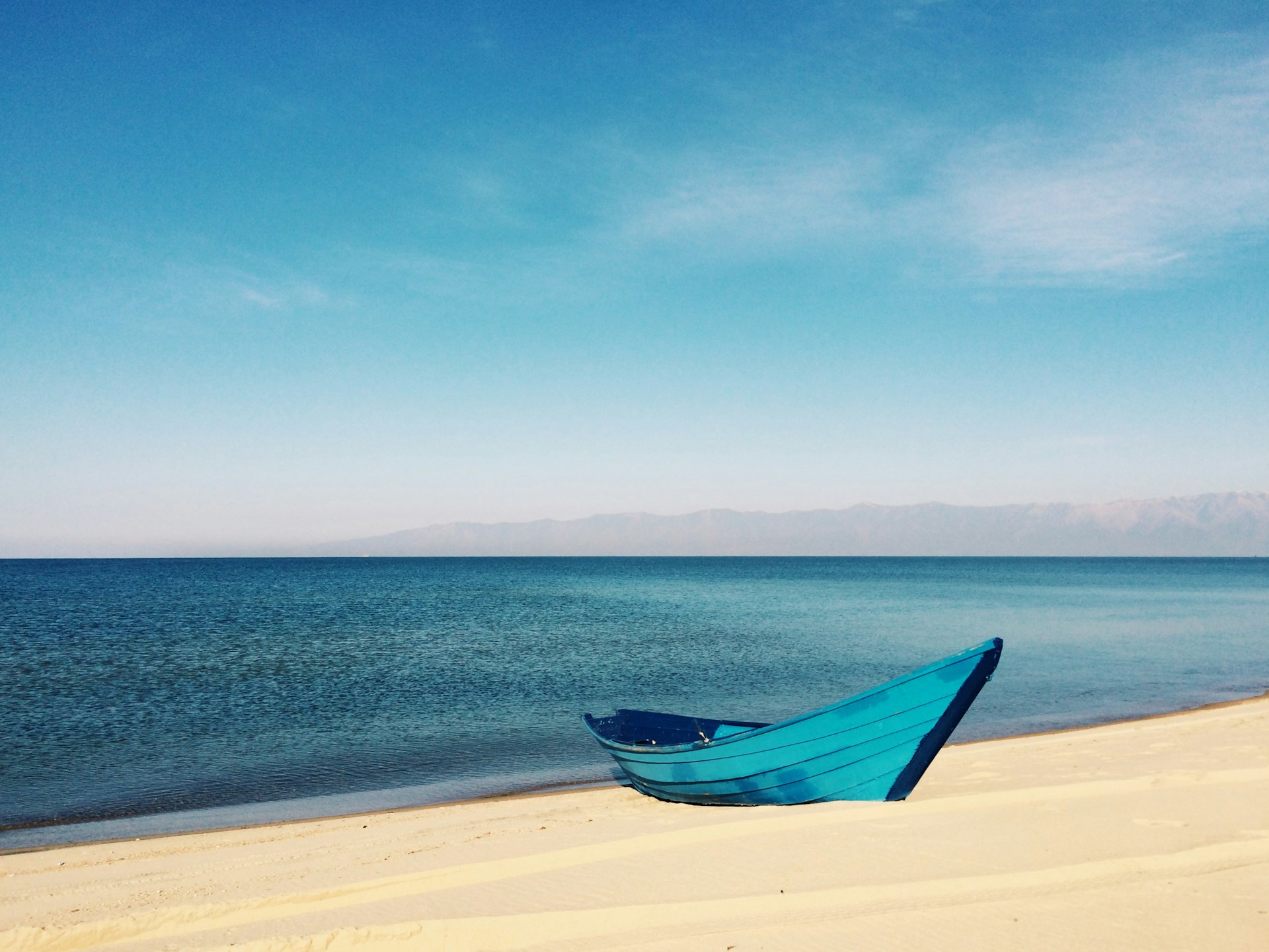 Canoe on serene water.